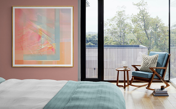 a bedroom showing my image 'Fuchsia Receding' hanging on the wall