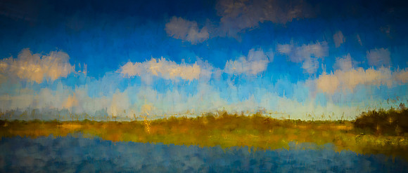 Rich tones showing lake, marsh grasses, trees and skies